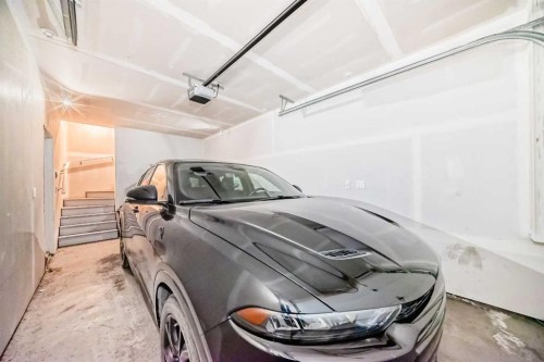 202-245 Redstone Walk Ne, Calgary, AB - Indoor Photo Showing Garage