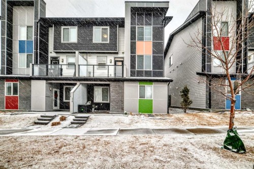 202-245 Redstone Walk Ne, Calgary, AB - Outdoor With Balcony With Facade