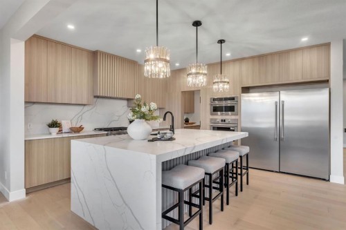 28 Spring Creek Point Sw, Calgary, AB - Indoor Photo Showing Kitchen With Upgraded Kitchen