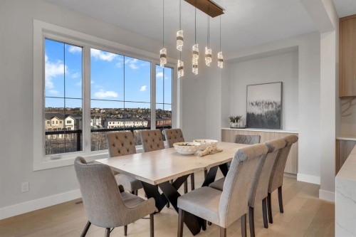 28 Spring Creek Point Sw, Calgary, AB - Indoor Photo Showing Dining Room