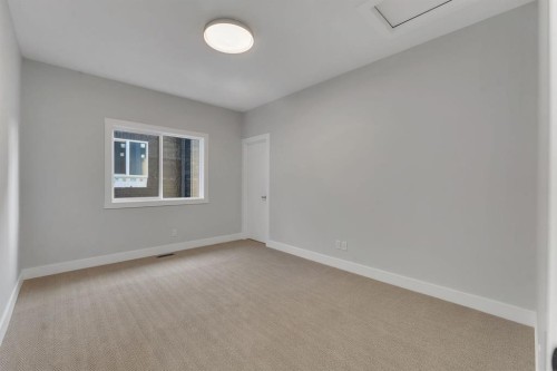 28 Spring Creek Point Sw, Calgary, AB - Indoor Photo Showing Other Room