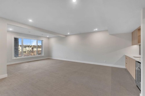 28 Spring Creek Point Sw, Calgary, AB - Indoor Photo Showing Other Room