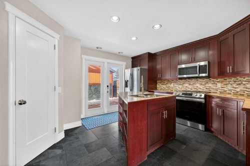 132 Erin Grove Close Se, Calgary, AB - Indoor Photo Showing Kitchen