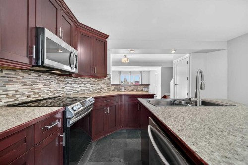 132 Erin Grove Close Se, Calgary, AB - Indoor Photo Showing Kitchen With Upgraded Kitchen
