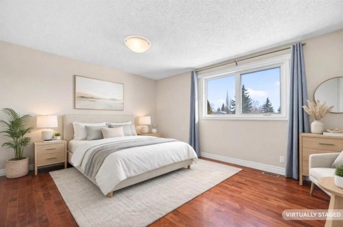132 Erin Grove Close Se, Calgary, AB - Indoor Photo Showing Bedroom