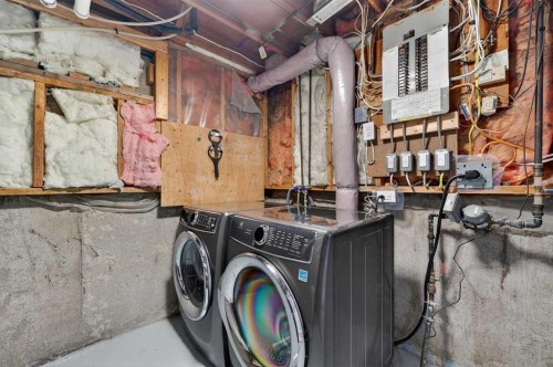 132 Erin Grove Close Se, Calgary, AB - Indoor Photo Showing Laundry Room