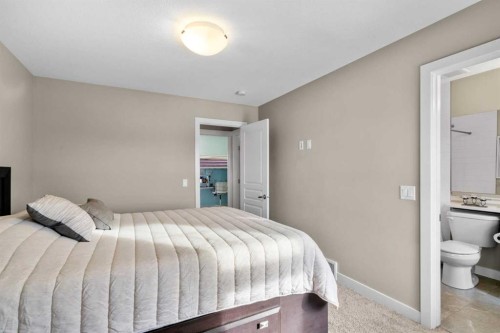 603-32 Horseshoe Crescent, Cochrane, AB - Indoor Photo Showing Bedroom