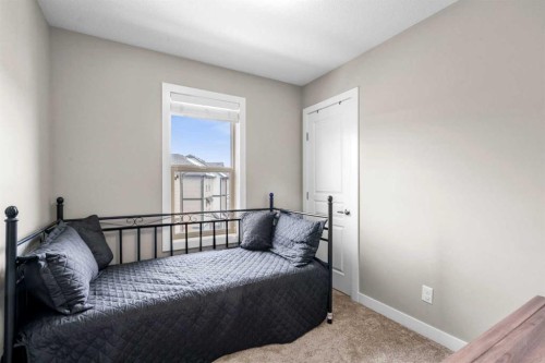 603-32 Horseshoe Crescent, Cochrane, AB - Indoor Photo Showing Bedroom