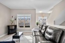 603-32 Horseshoe Crescent, Cochrane, AB  - Indoor Photo Showing Living Room 