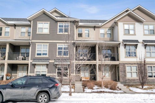 603-32 Horseshoe Crescent, Cochrane, AB - Outdoor With Balcony With Facade