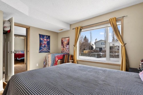 57 Shannon Circle Sw, Calgary, AB - Indoor Photo Showing Bedroom