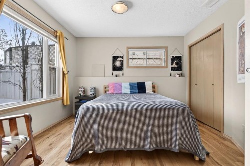 57 Shannon Circle Sw, Calgary, AB - Indoor Photo Showing Bedroom