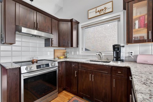 57 Shannon Circle Sw, Calgary, AB - Indoor Photo Showing Kitchen With Upgraded Kitchen