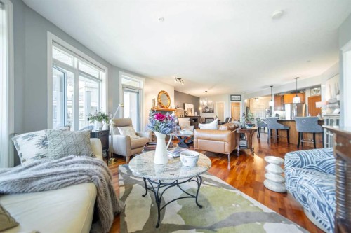 205-4 Hemlock Crescent Sw, Calgary, AB - Indoor Photo Showing Living Room