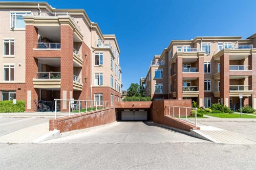 205-4 Hemlock Crescent Sw, Calgary, AB - Outdoor With Facade