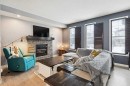 231 Prestwick Point Se, Calgary, AB  - Indoor Photo Showing Living Room With Fireplace 
