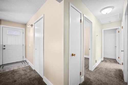 1007 Hunterston Place Nw, Calgary, AB - Indoor Photo Showing Other Room