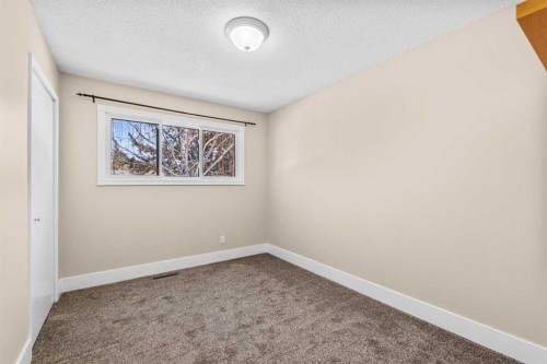1007 Hunterston Place Nw, Calgary, AB - Indoor Photo Showing Other Room