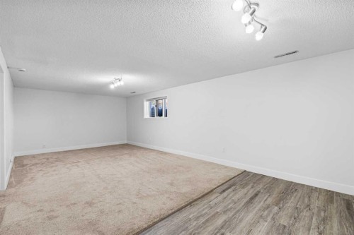 1007 Hunterston Place Nw, Calgary, AB - Indoor Photo Showing Other Room
