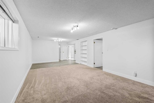 1007 Hunterston Place Nw, Calgary, AB - Indoor Photo Showing Other Room