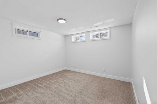 1007 Hunterston Place Nw, Calgary, AB - Indoor Photo Showing Other Room