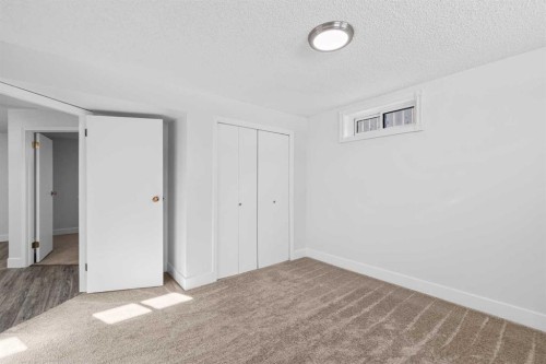 1007 Hunterston Place Nw, Calgary, AB - Indoor Photo Showing Other Room