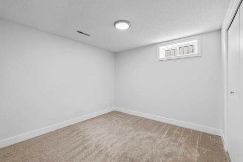 1007 Hunterston Place Nw, Calgary, AB - Indoor Photo Showing Other Room