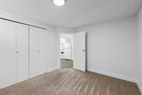 1007 Hunterston Place Nw, Calgary, AB - Indoor Photo Showing Other Room