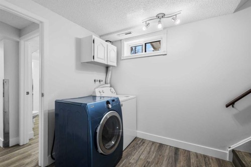 1007 Hunterston Place Nw, Calgary, AB - Indoor Photo Showing Laundry Room