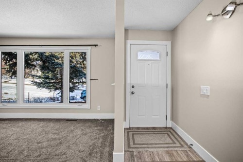 1007 Hunterston Place Nw, Calgary, AB - Indoor Photo Showing Other Room