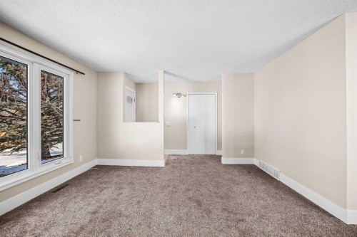1007 Hunterston Place Nw, Calgary, AB - Indoor Photo Showing Other Room