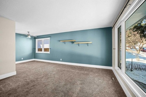 1007 Hunterston Place Nw, Calgary, AB - Indoor Photo Showing Other Room