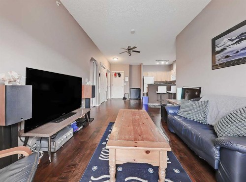 2313-70 Panamount Drive Nw, Calgary, AB - Indoor Photo Showing Living Room