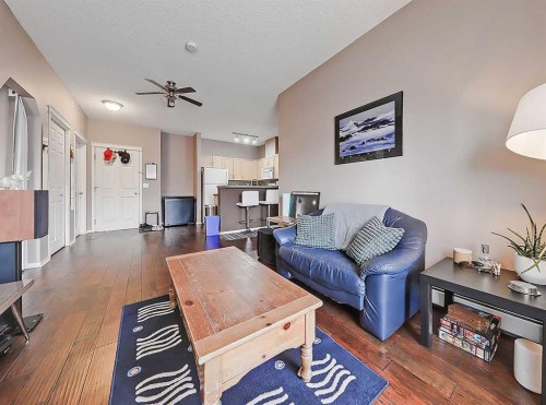 2313-70 Panamount Drive Nw, Calgary, AB - Indoor Photo Showing Living Room