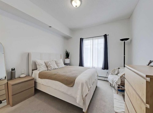 2313-70 Panamount Drive Nw, Calgary, AB - Indoor Photo Showing Bedroom