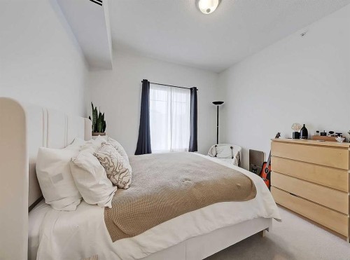 2313-70 Panamount Drive Nw, Calgary, AB - Indoor Photo Showing Bedroom