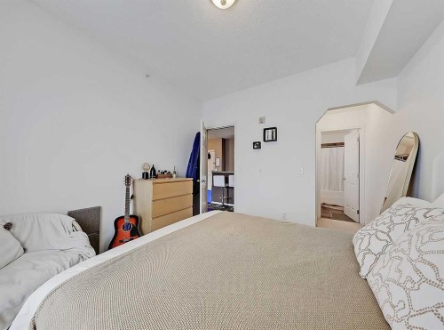 2313-70 Panamount Drive Nw, Calgary, AB - Indoor Photo Showing Bedroom