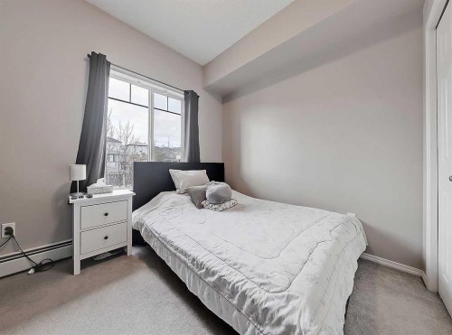 2313-70 Panamount Drive Nw, Calgary, AB - Indoor Photo Showing Bedroom