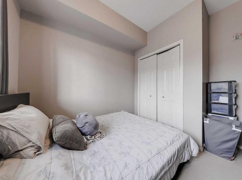 2313-70 Panamount Drive Nw, Calgary, AB - Indoor Photo Showing Bedroom