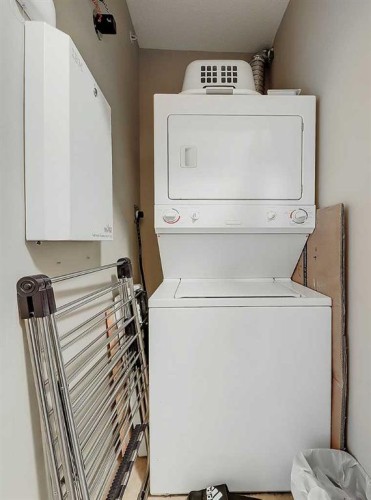 2313-70 Panamount Drive Nw, Calgary, AB - Indoor Photo Showing Laundry Room
