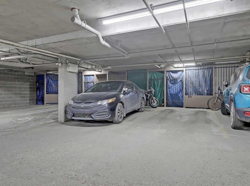 2313-70 Panamount Drive Nw, Calgary, AB - Indoor Photo Showing Garage
