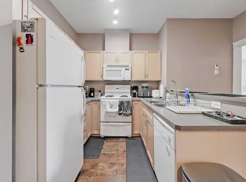 2313-70 Panamount Drive Nw, Calgary, AB - Indoor Photo Showing Kitchen