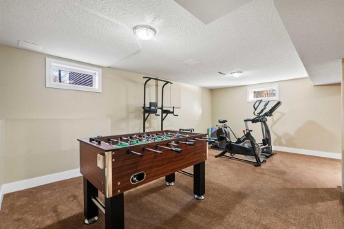 612 Willoughby Crescent Se, Calgary, AB - Indoor Photo Showing Gym Room
