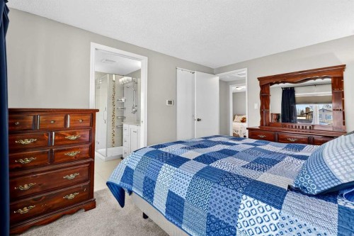 168 Midlake Boulevard Se, Calgary, AB - Indoor Photo Showing Bedroom
