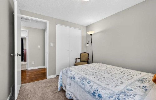 168 Midlake Boulevard Se, Calgary, AB - Indoor Photo Showing Bedroom