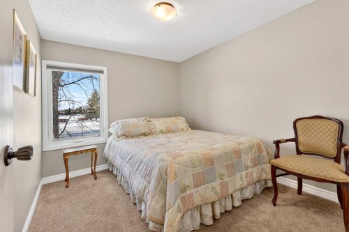 168 Midlake Boulevard Se, Calgary, AB - Indoor Photo Showing Bedroom