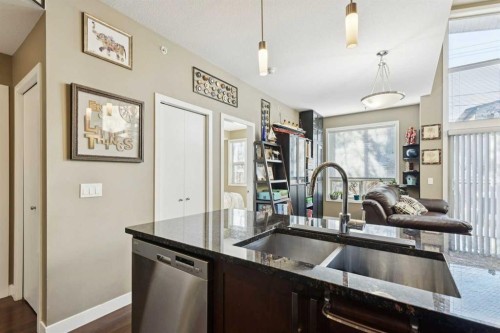 411-4303 1 Street Ne, Calgary, AB - Indoor Photo Showing Kitchen With Double Sink With Upgraded Kitchen