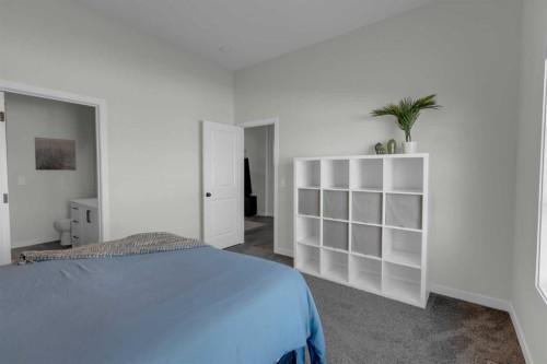 812 Reynolds Manor Sw, Airdrie, AB - Indoor Photo Showing Bedroom