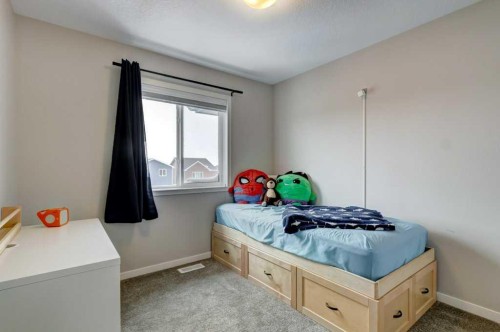 217 D'Arcy Ranch Drive, Okotoks, AB - Indoor Photo Showing Bedroom