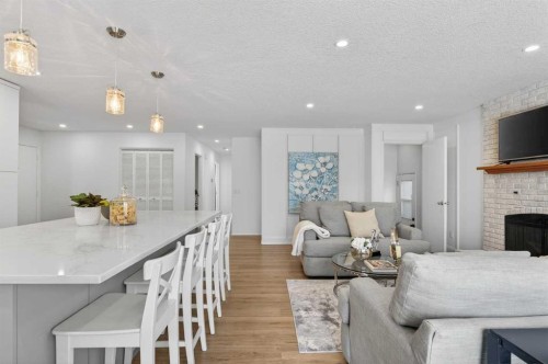60 Sunmount Close Se, Calgary, AB - Indoor With Fireplace